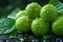 a group of green fruit with water droplets on them