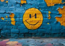 a blue brick wall with a smiley face painted on it