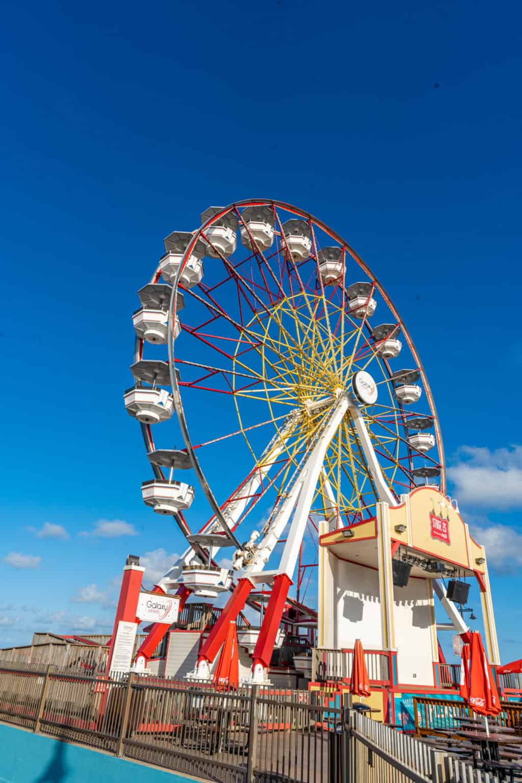 a ferris wheel with blue sky