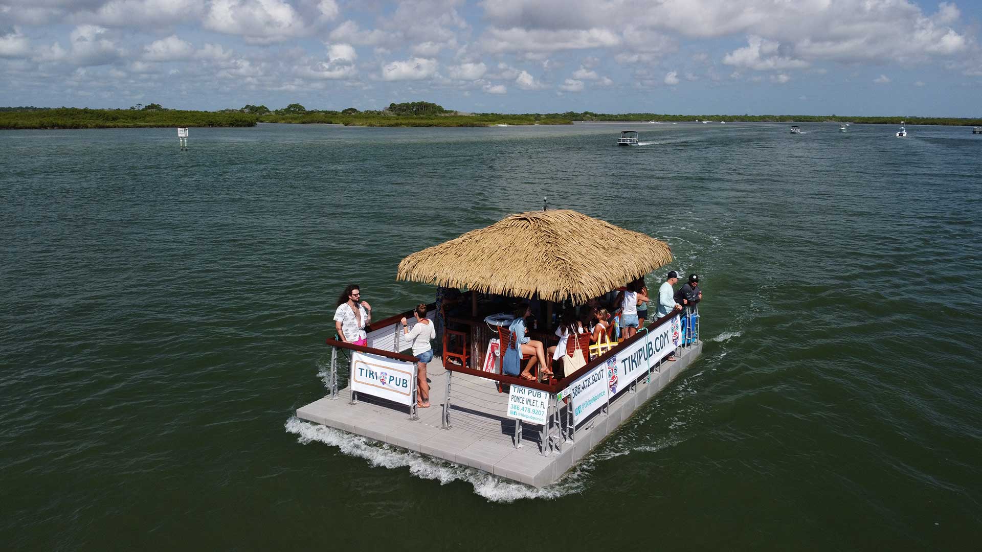 a group of people on a floating platform