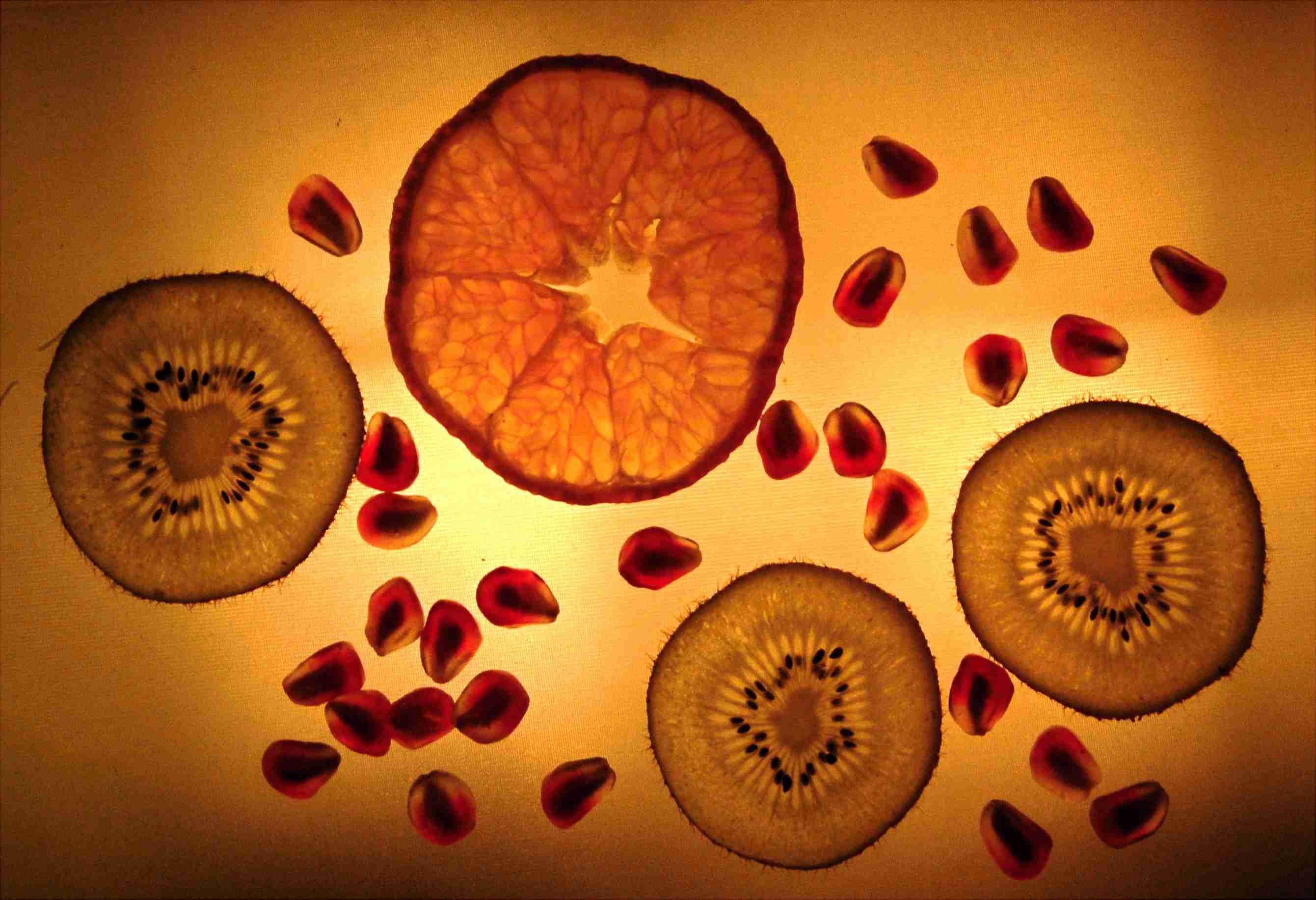 a group of fruit slices and seeds