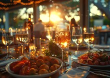 a table with food and wine glasses