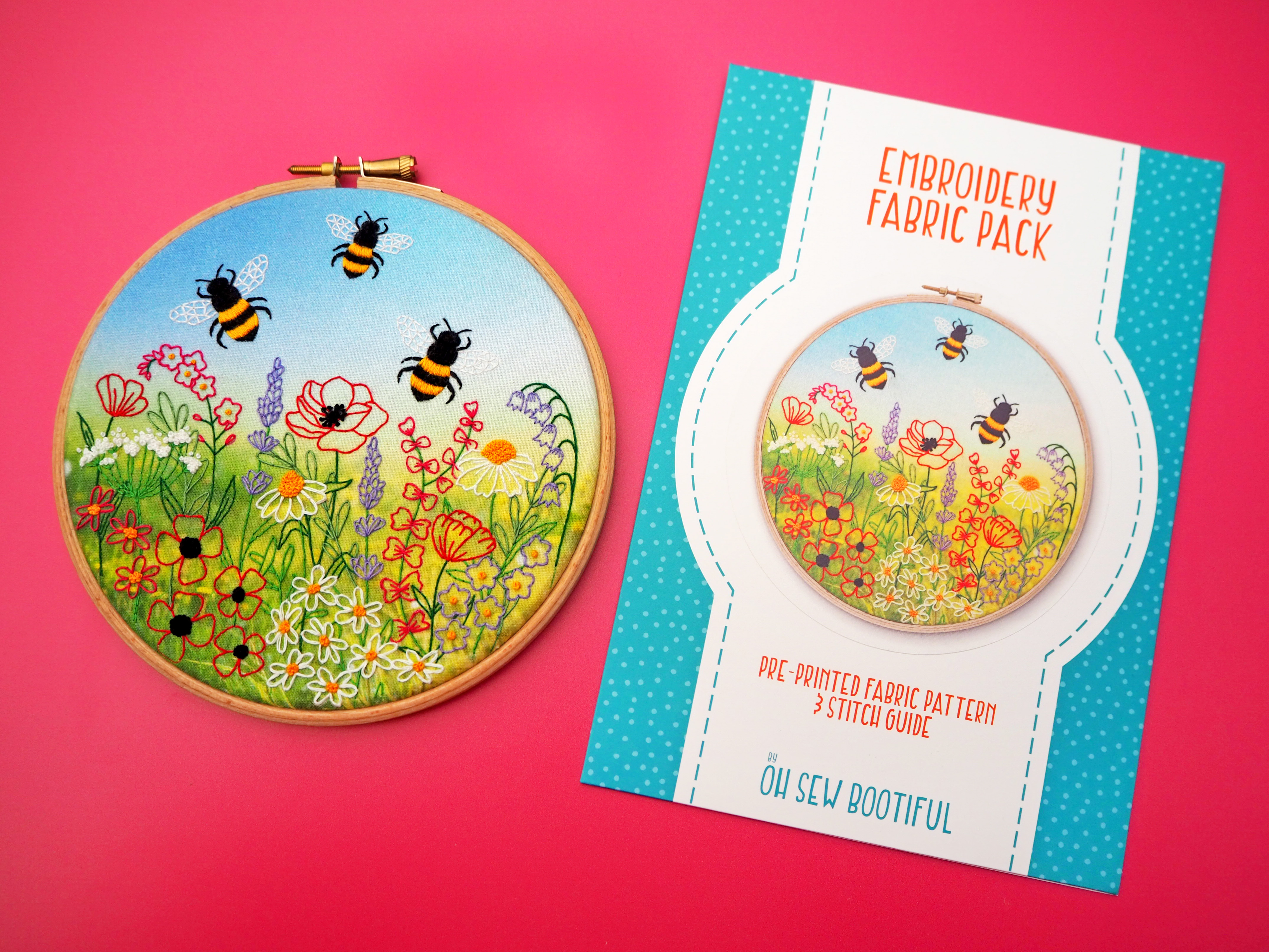 a embroidery hoops with bees and flowers