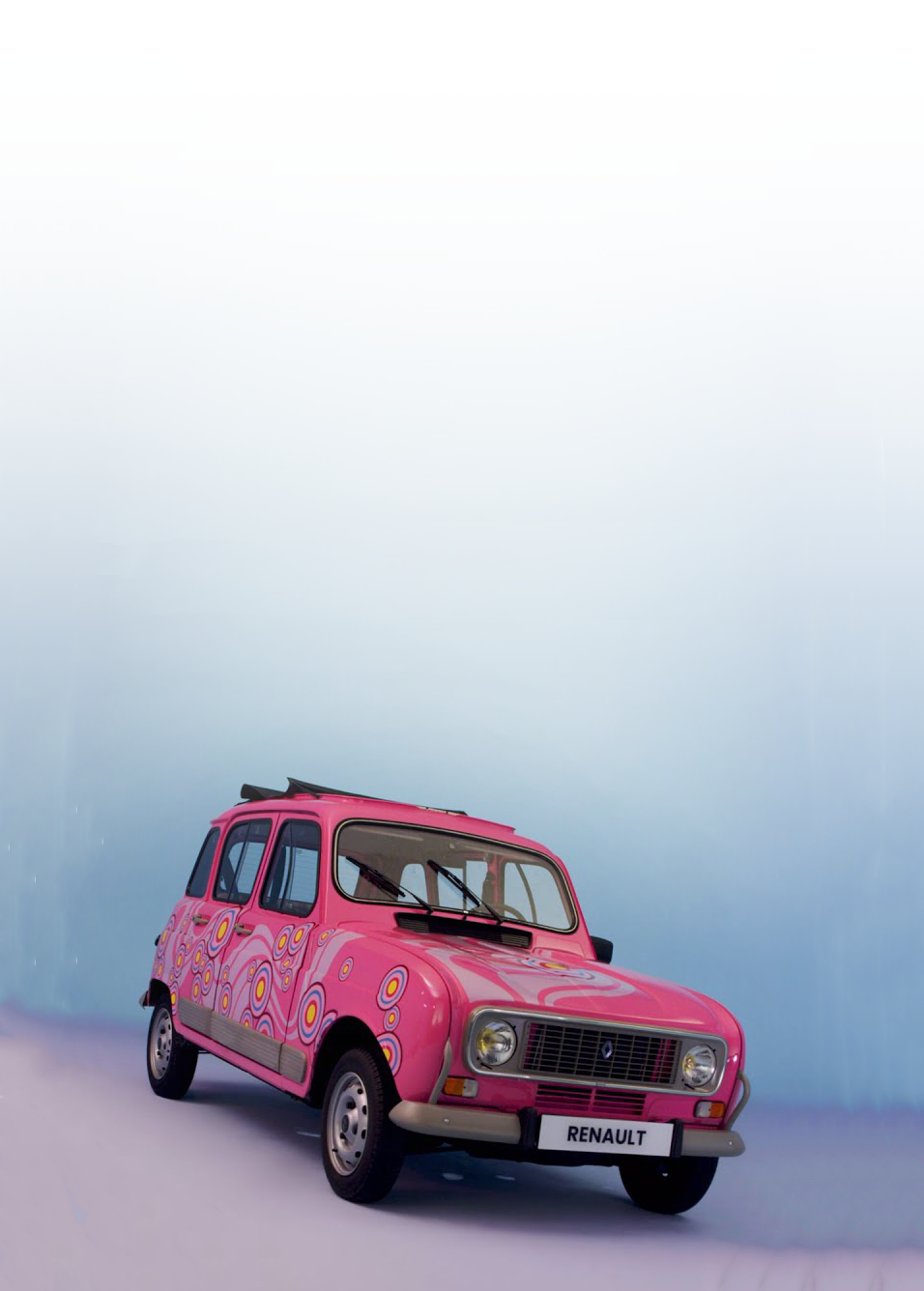 a pink car with a painted design