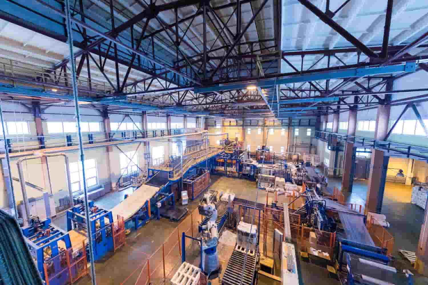 a large warehouse with lots of machinery