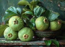 a group of green fruit on a table