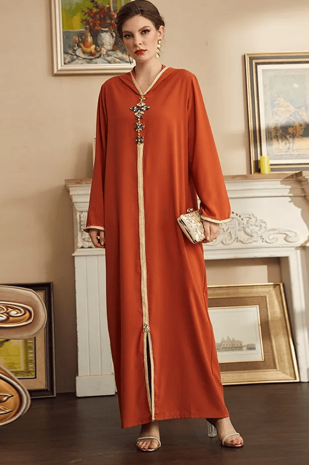 a woman in a long orange robe