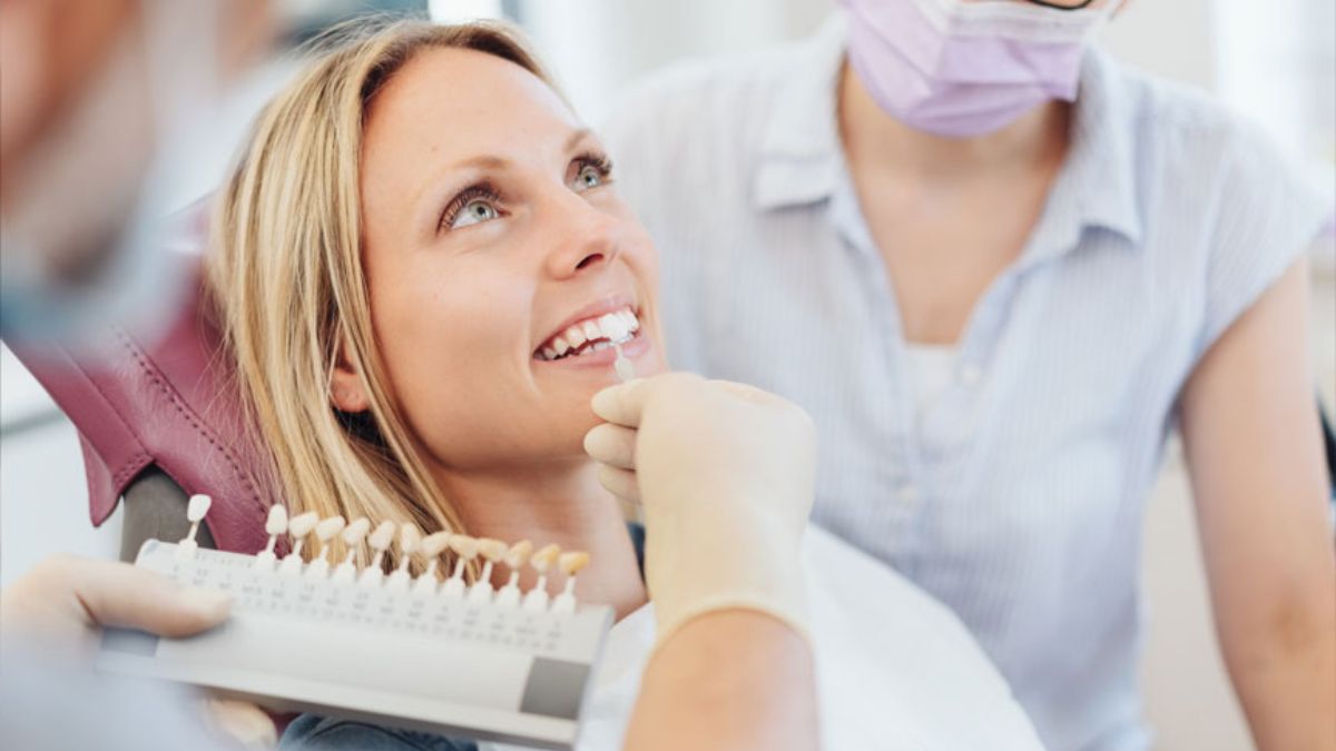 a woman getting her teeth checked