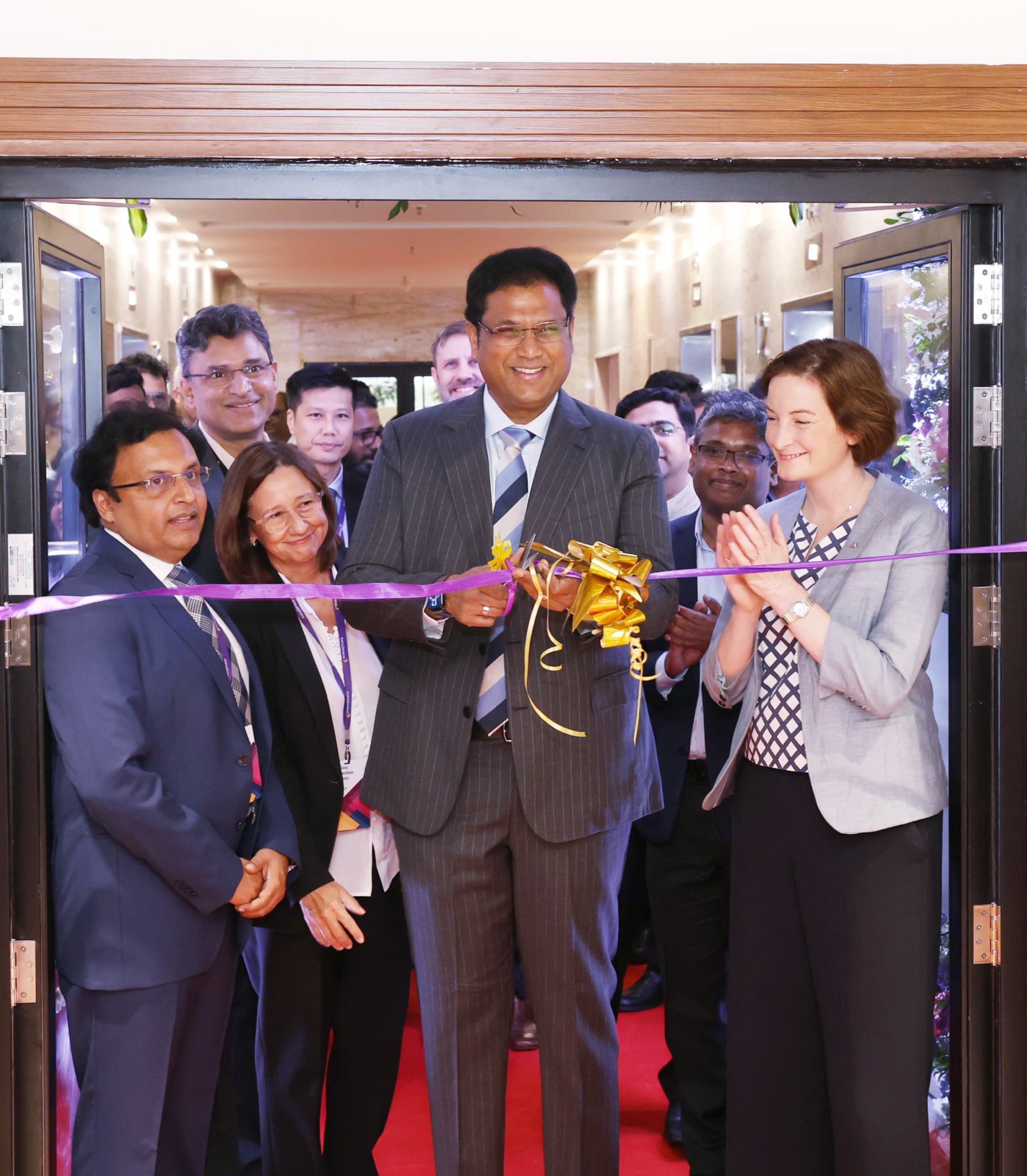 a group of people standing in front of a door opening