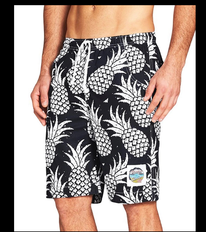 a man wearing a black and white swim trunks