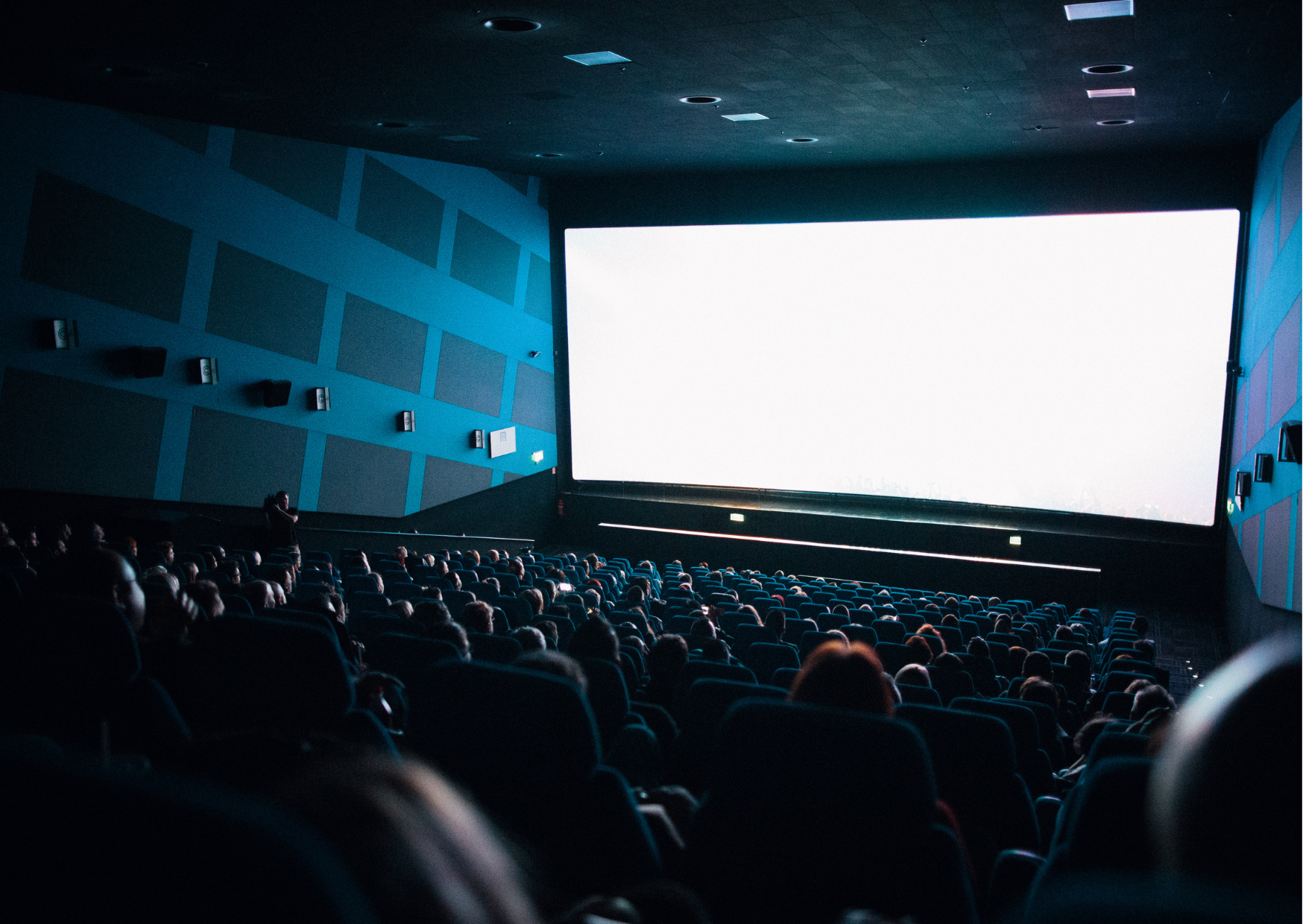 a movie theater with a large screen