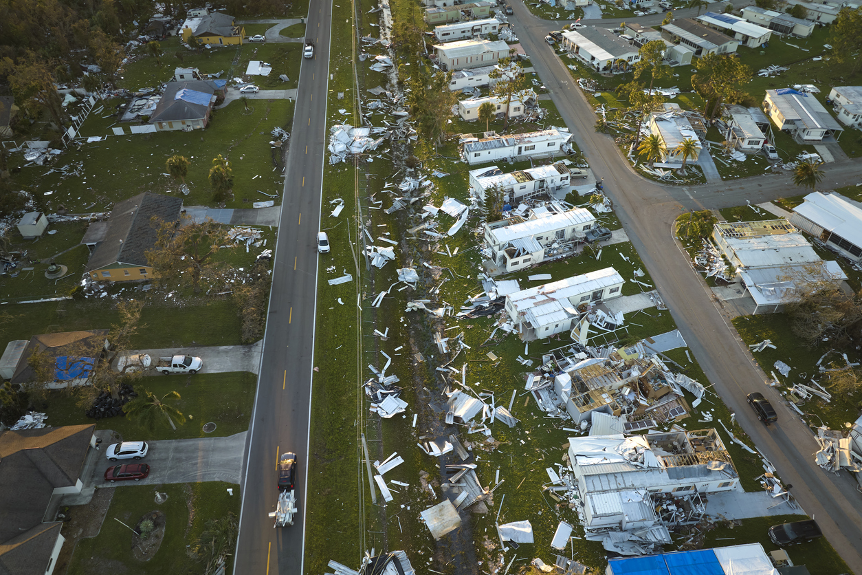 a destroyed mobile homes and a road