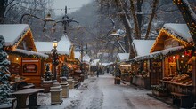 a snowy street with buildings and trees