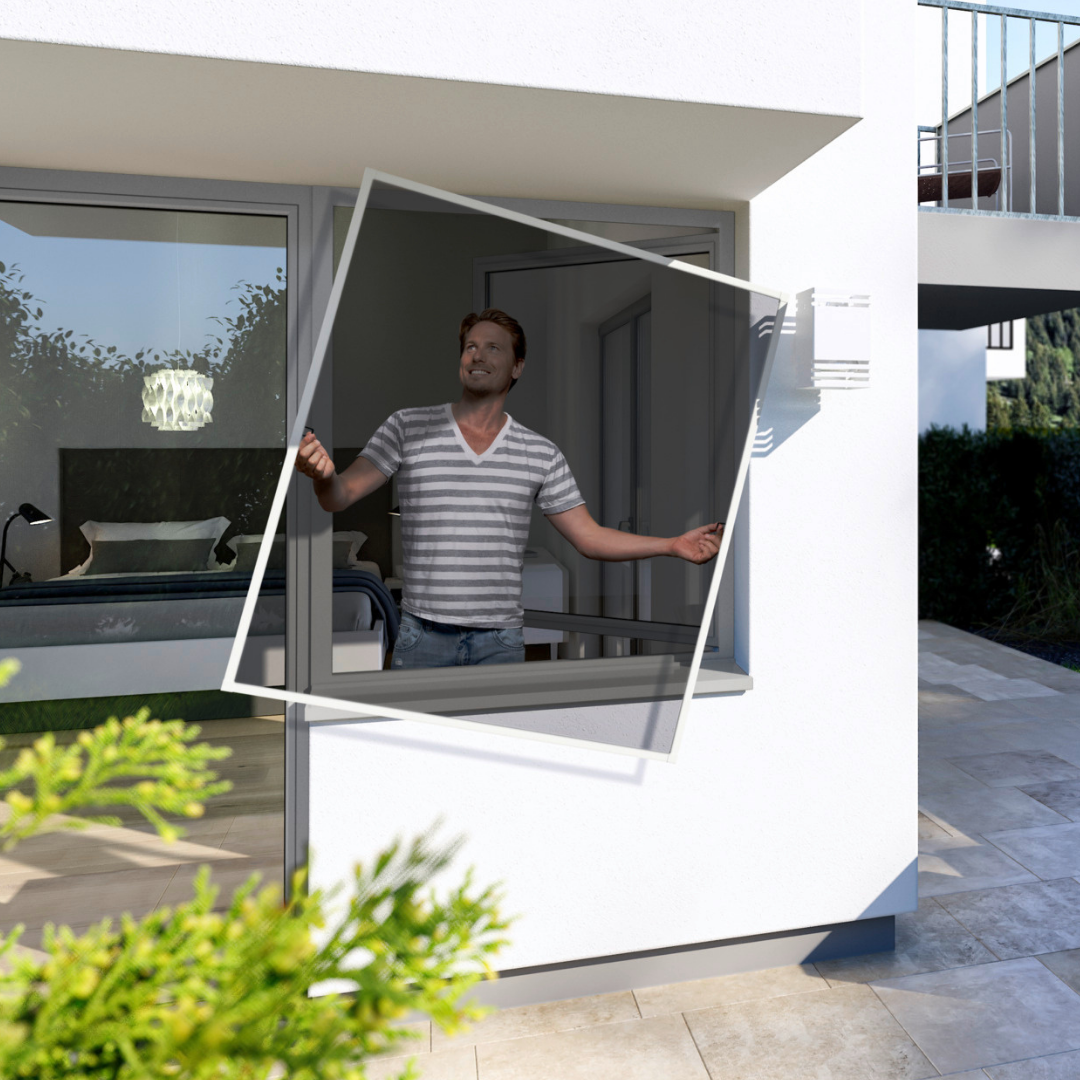 a man standing in a window