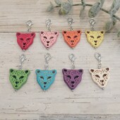 a group of colorful earrings