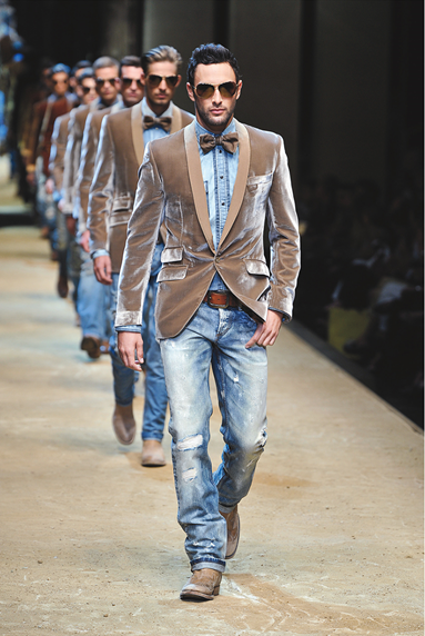 a group of men walking on a runway