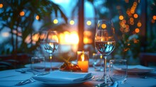 a table with wine glasses and candles