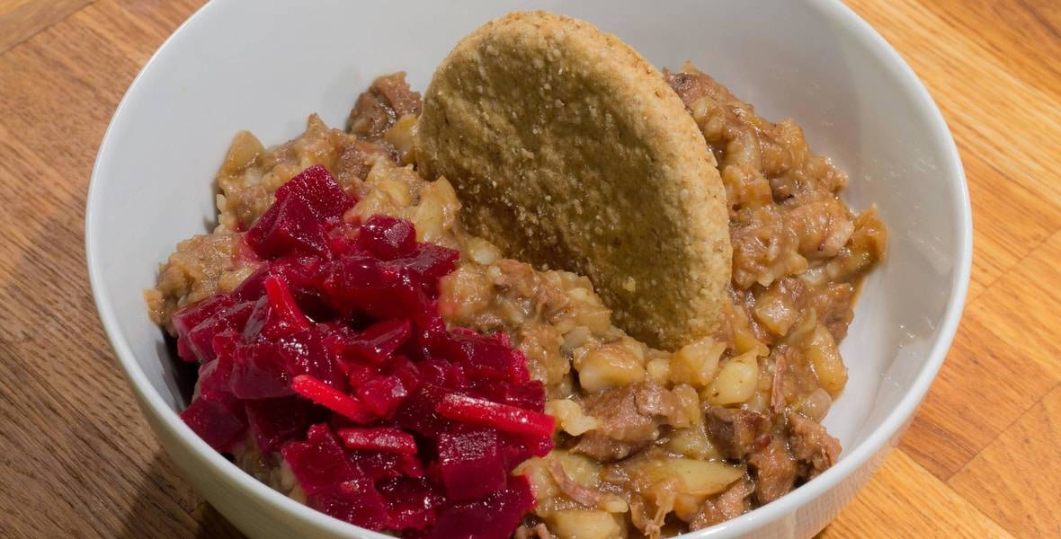 a bowl of food with crackers