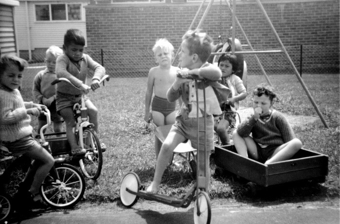 a group of children playing in a playground