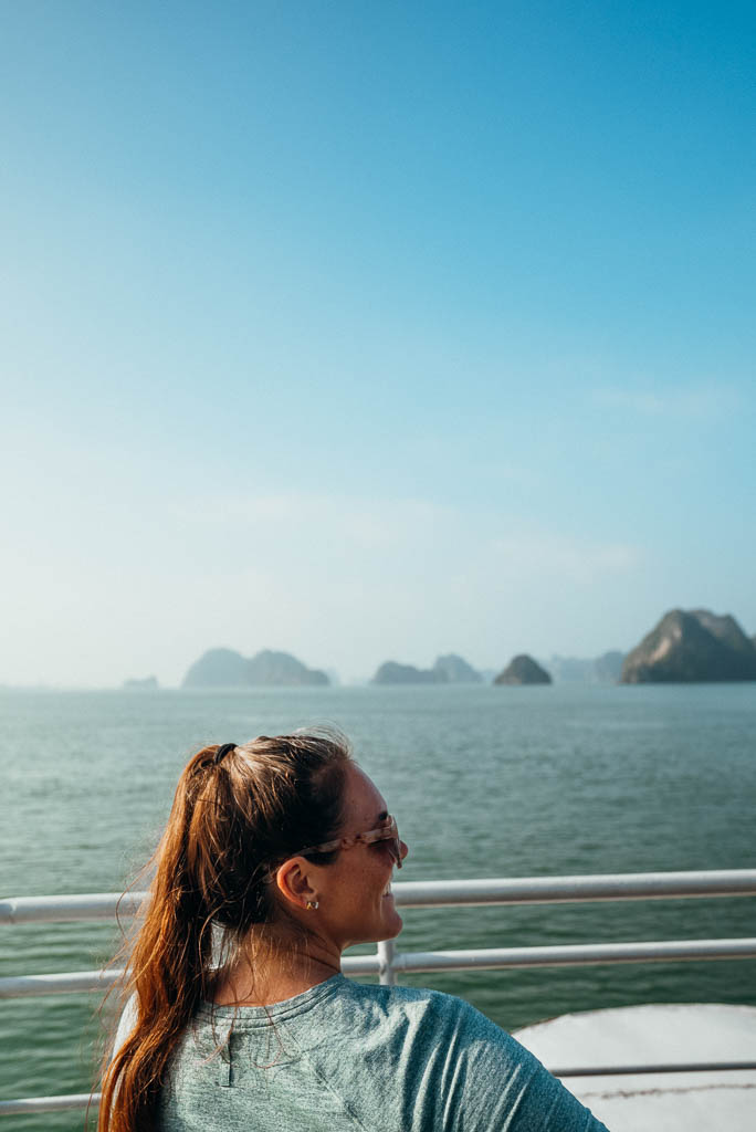 a woman looking at the ocean