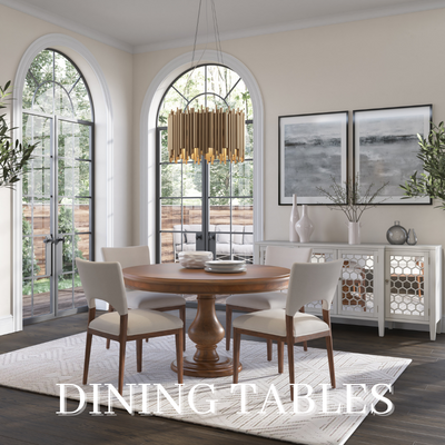 a dining room with a round table and chairs