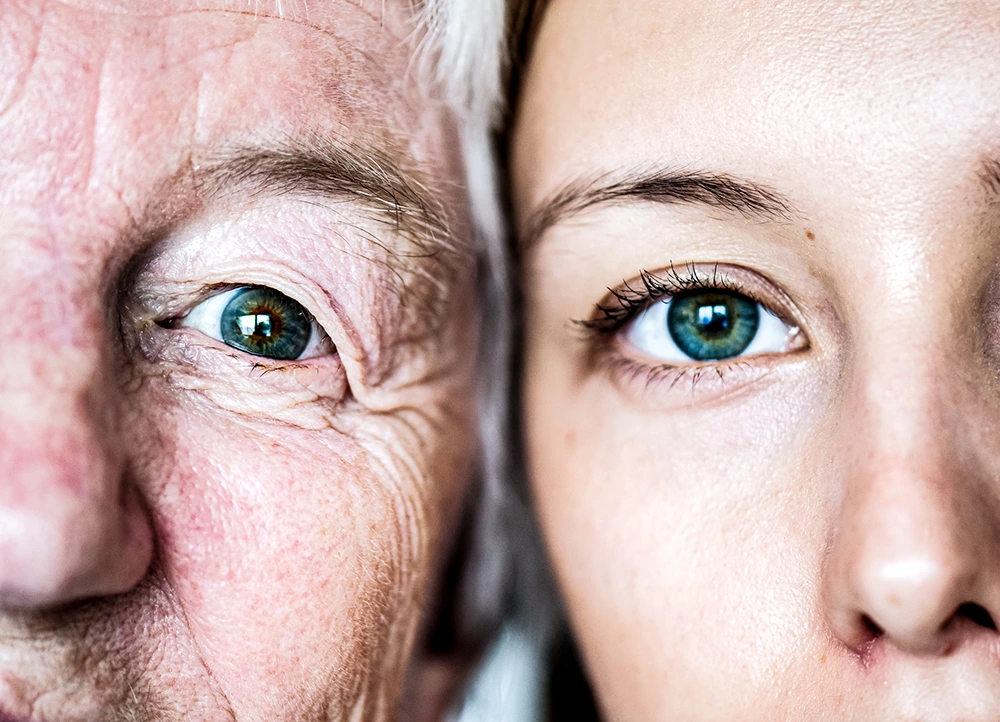 close up of an old man and a young woman