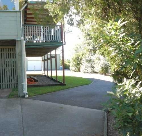 a house with a porch and a driveway