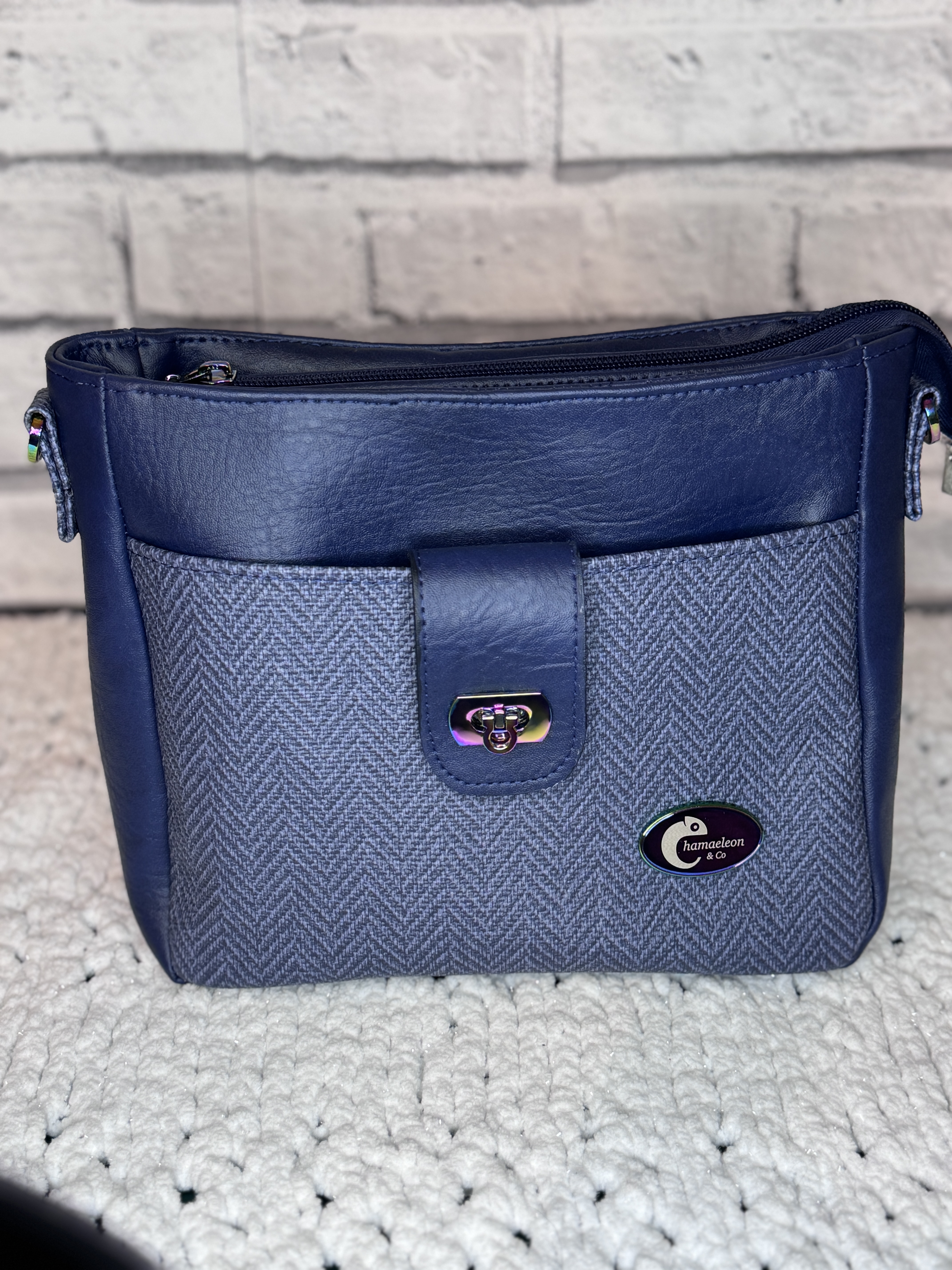 a blue and grey purse