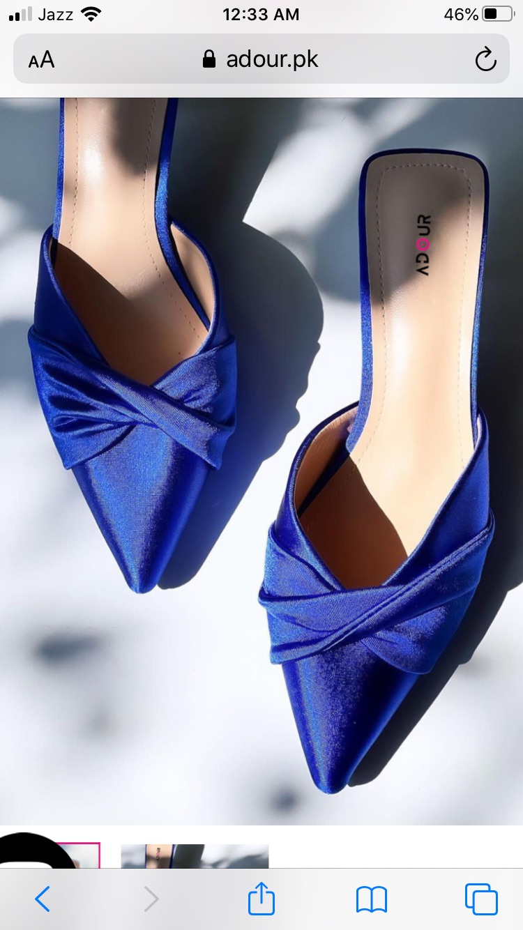 a pair of blue high heeled shoes