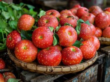 a basket of red apples