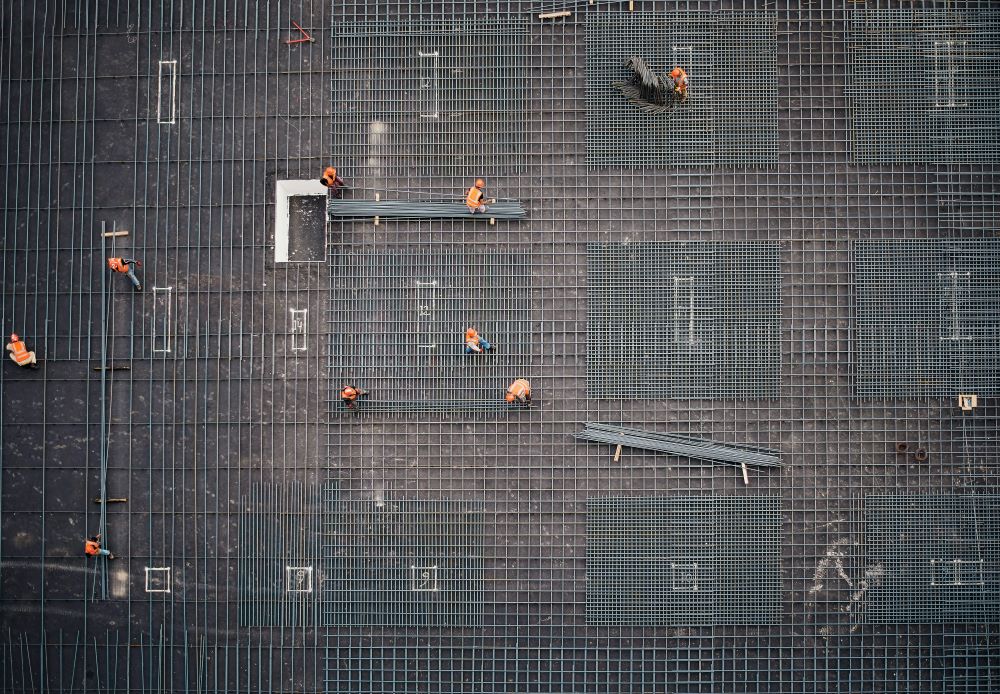 a group of people working on a construction site