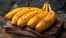 a bunch of bananas on a wood surface