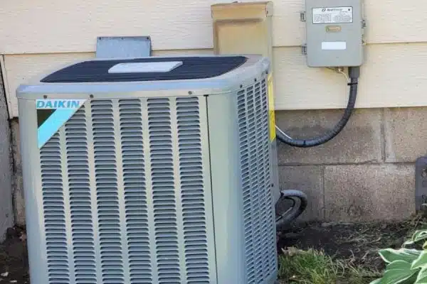 a air conditioner next to a building