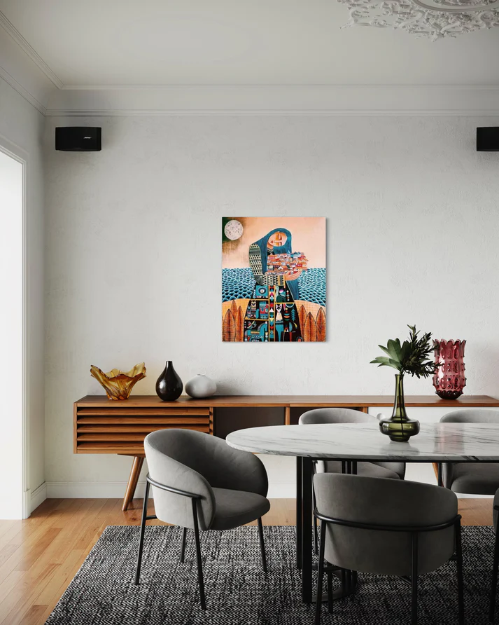 a dining table with chairs and a painting on the wall