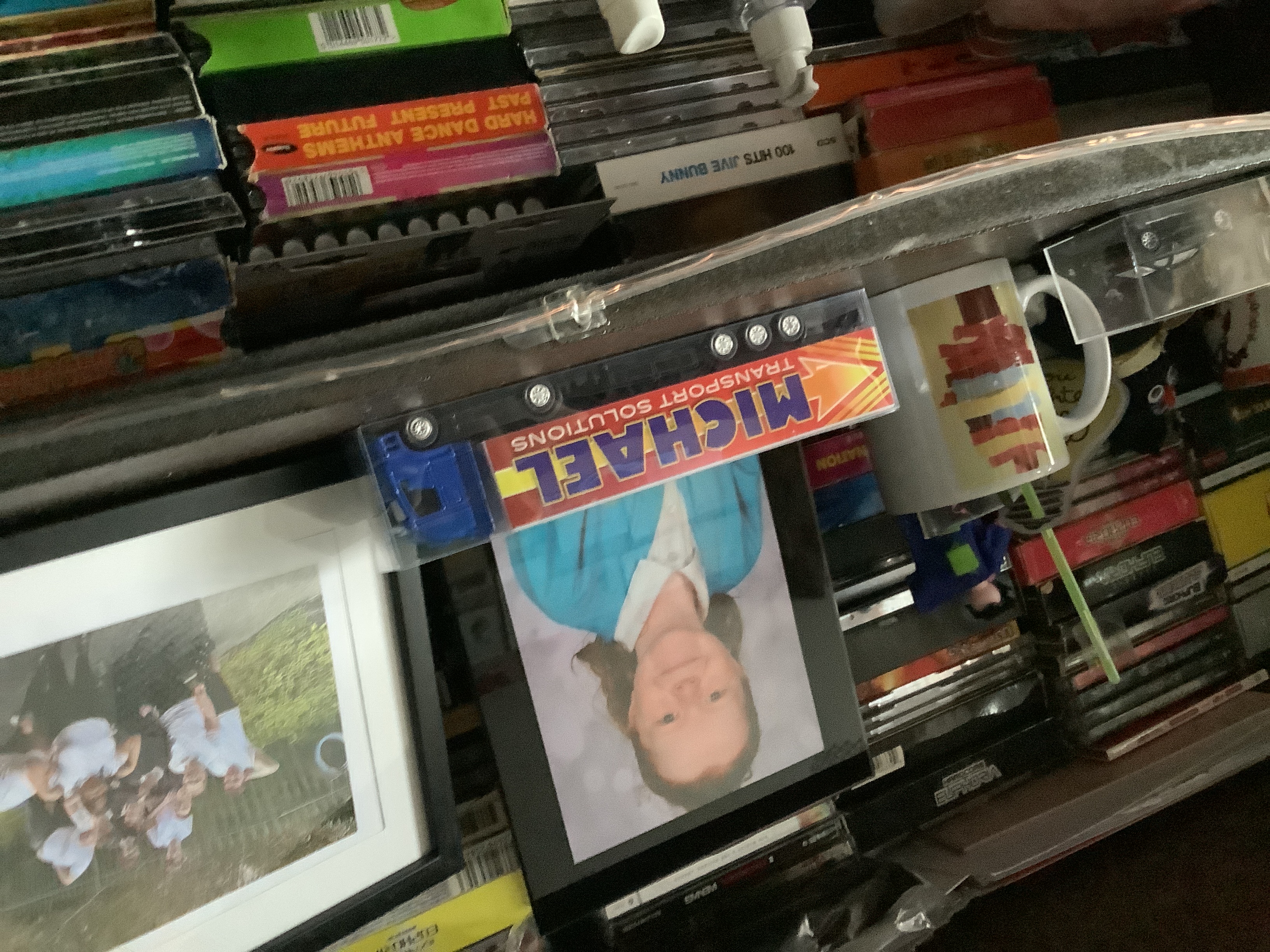 a picture of a child on a shelf