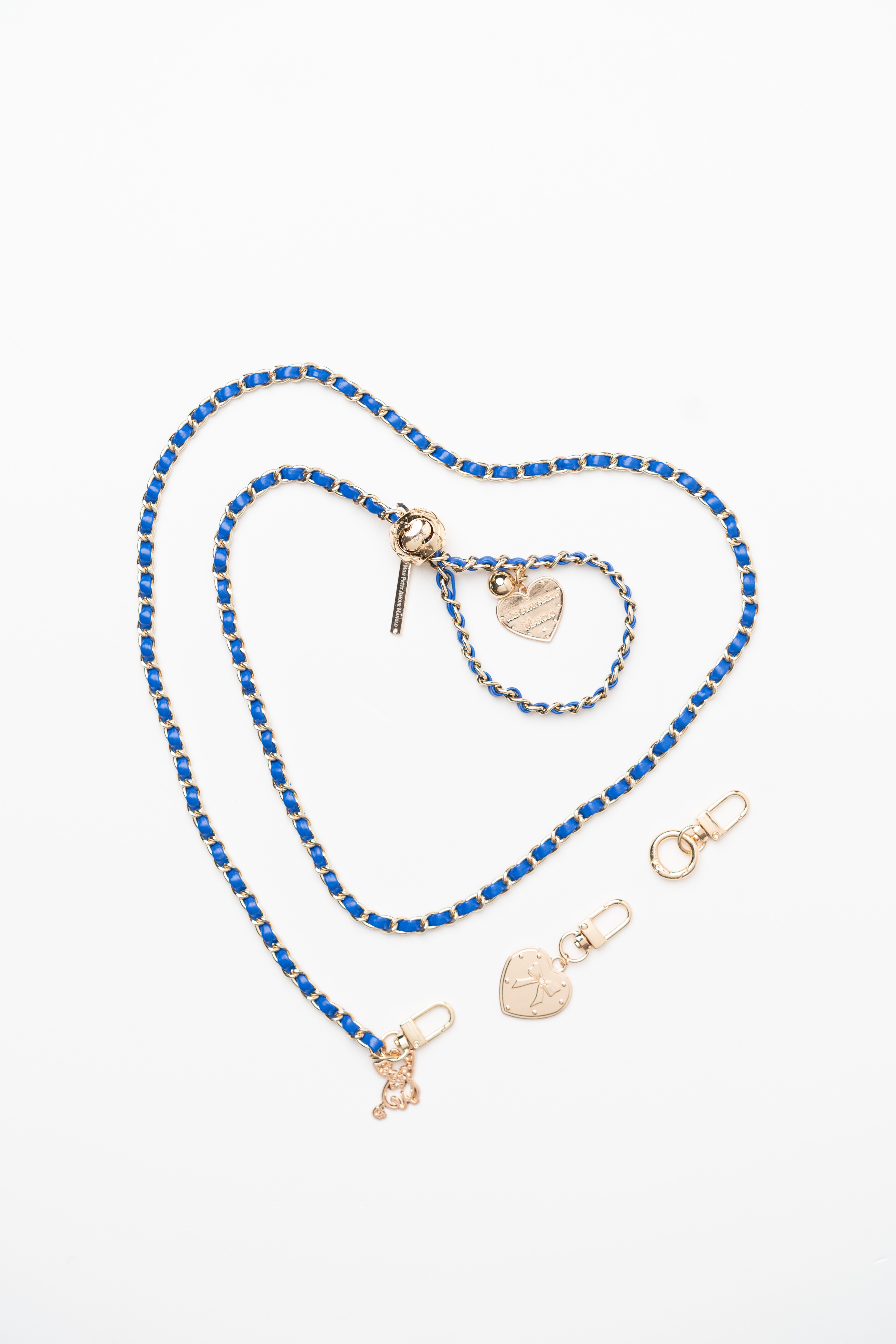 a blue and gold chain with a heart shaped charm