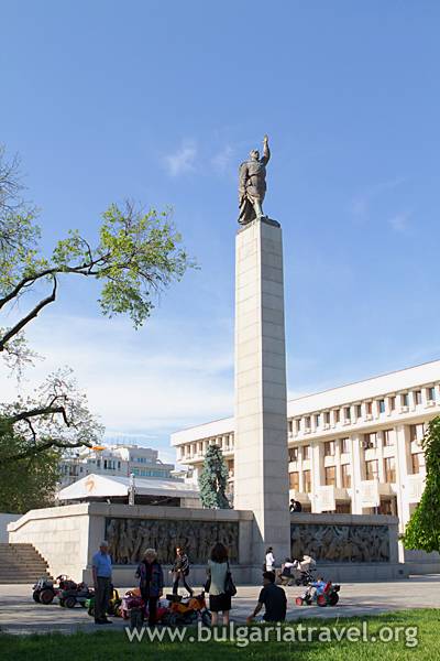 a statue of a man on a pillar