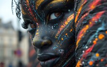 a woman with black paint on her face