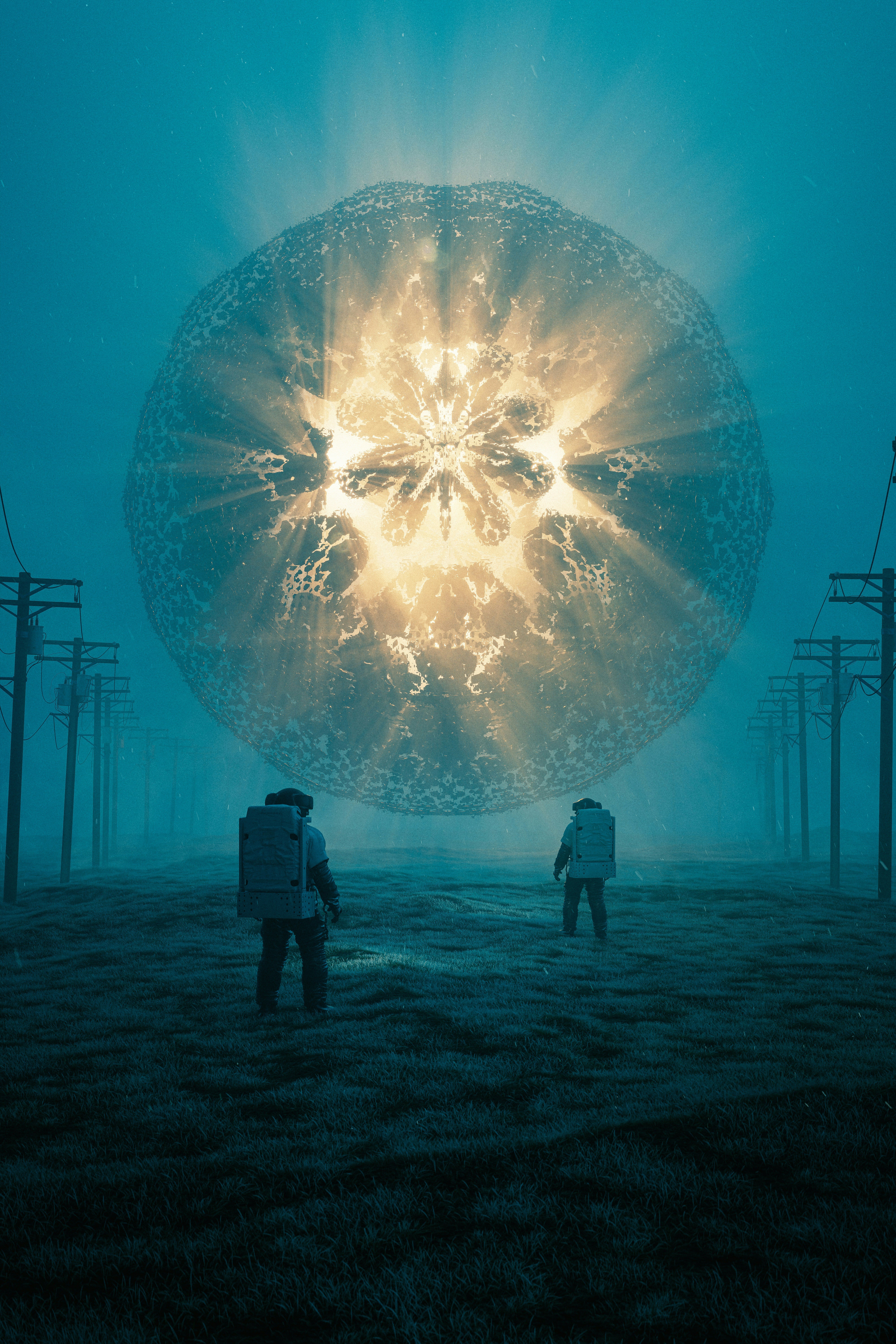 two people standing in a field with a large explosion