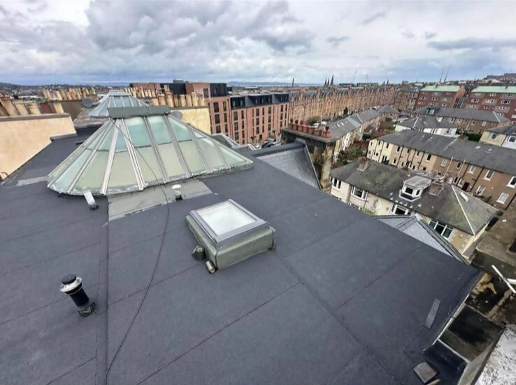 a rooftop of a building with a skylight