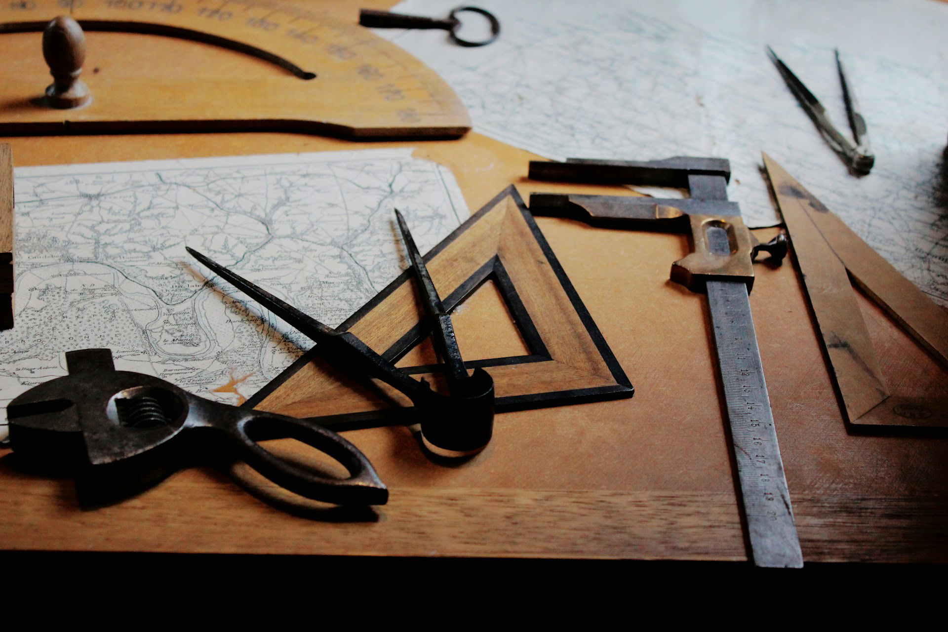 a group of scissors and ruler on a table