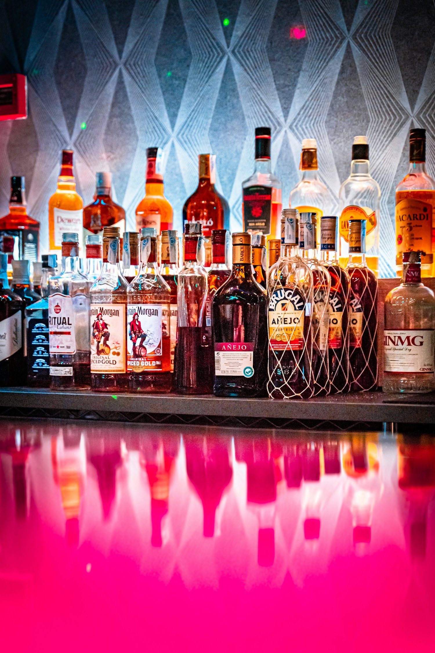 a group of bottles of alcohol on a counter