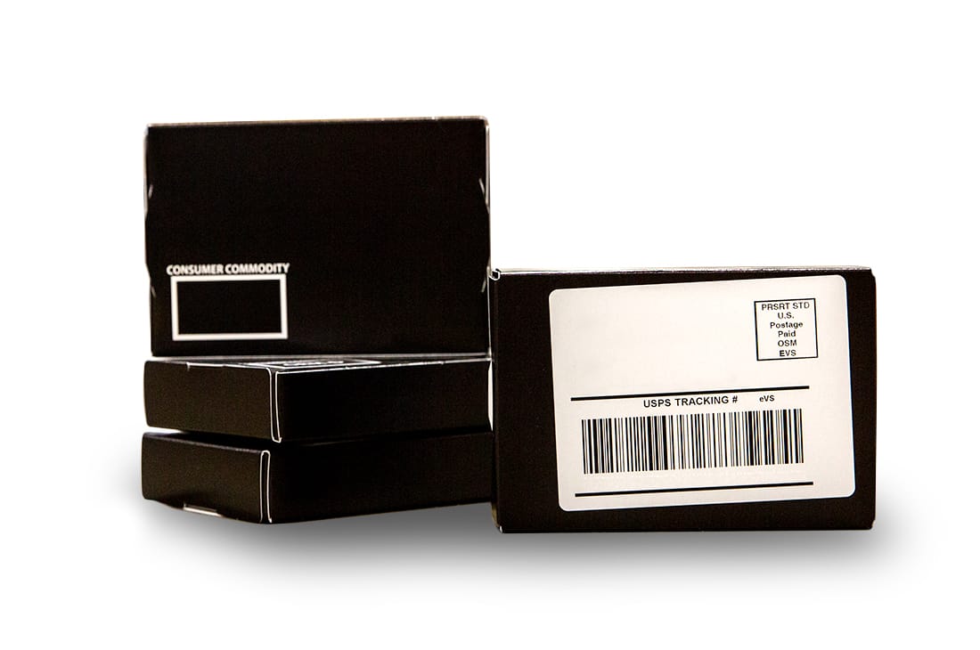 a stack of black boxes with a barcode on them