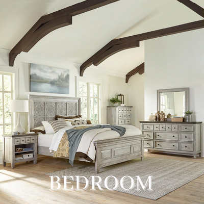 a bedroom with a bed and dressers