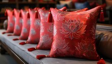 a row of red pillows with tassels