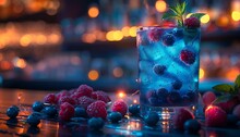 a blue drink with berries and ice