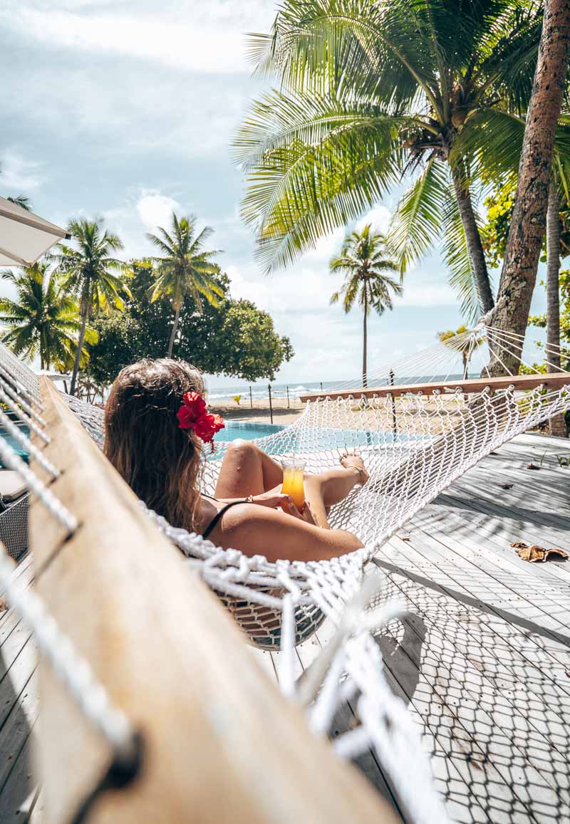 a woman lying in a hammock