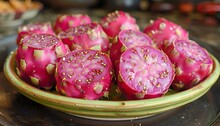 a plate of cut up cactus fruit