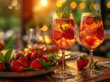 two glasses of drinks on a table