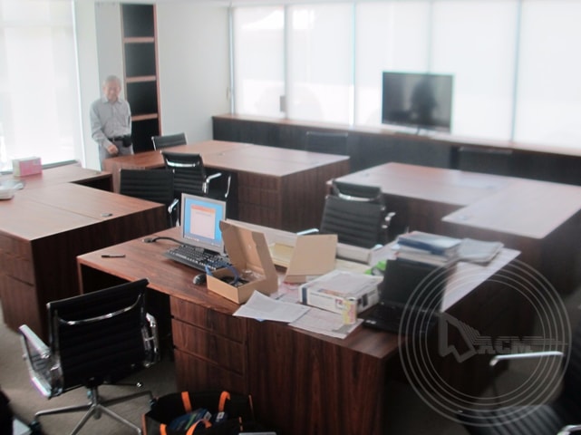 a man standing in an office